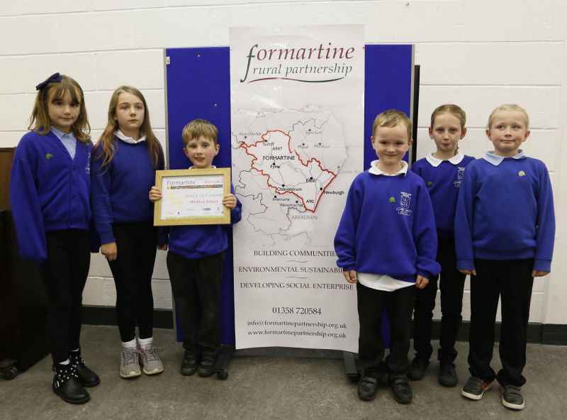 Silver gilt award - Methlick School receiving their award